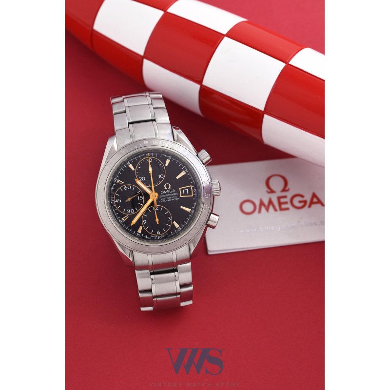 OMEGA (Chronographe Speedmaster Automatic Date - Black "Gold index" / ref. 178.0055), vers 2008